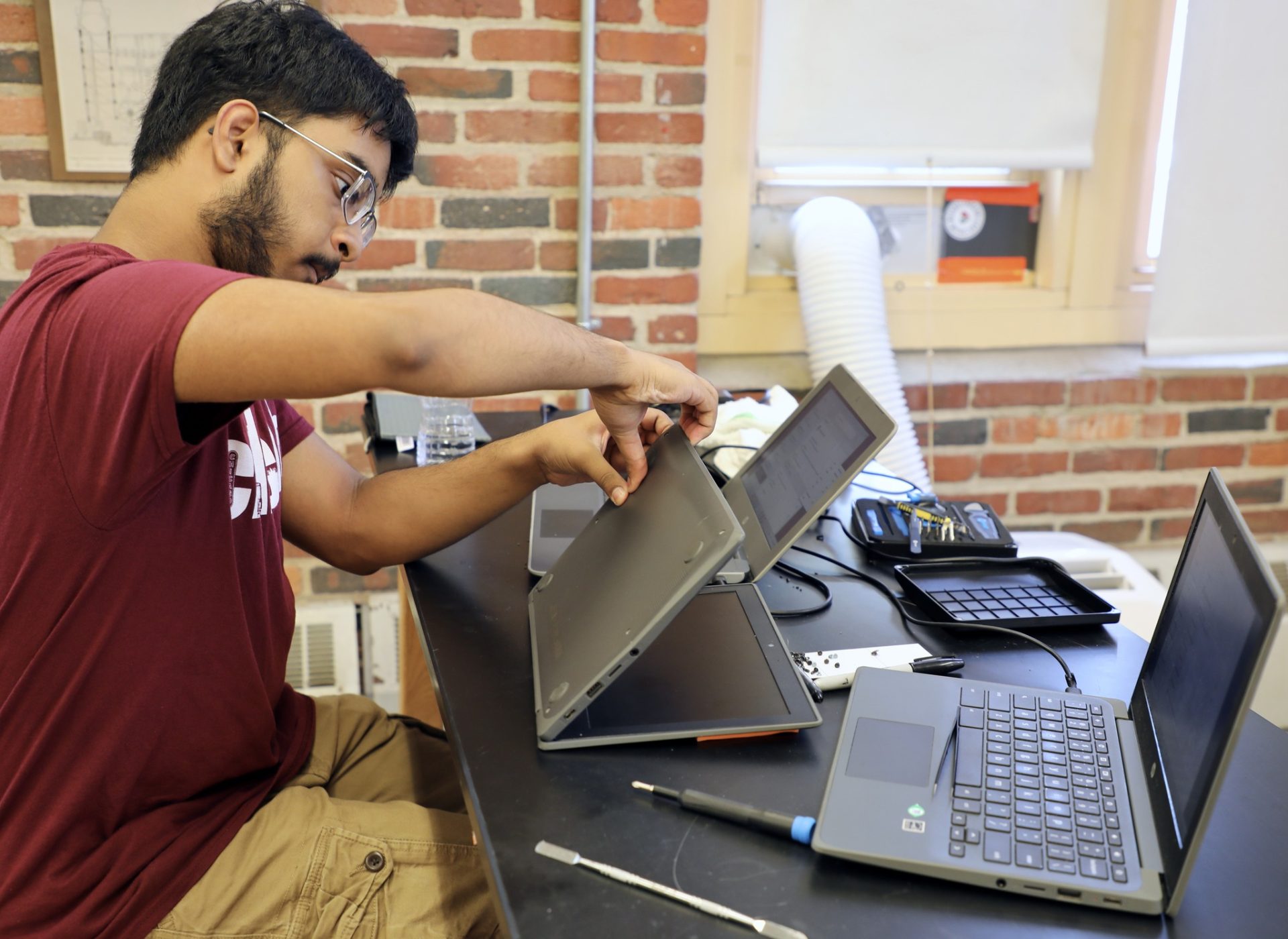 LHS Students Help with Tech Repairs - InsideLowell
